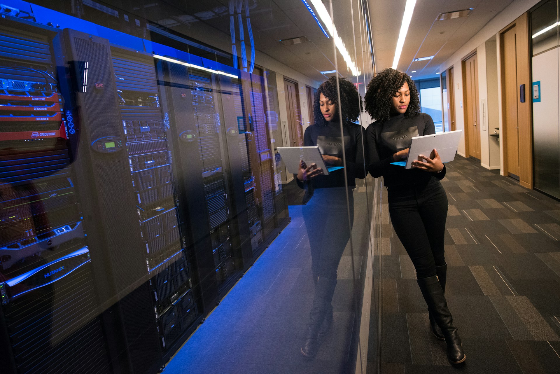 IT professionals in secure server room