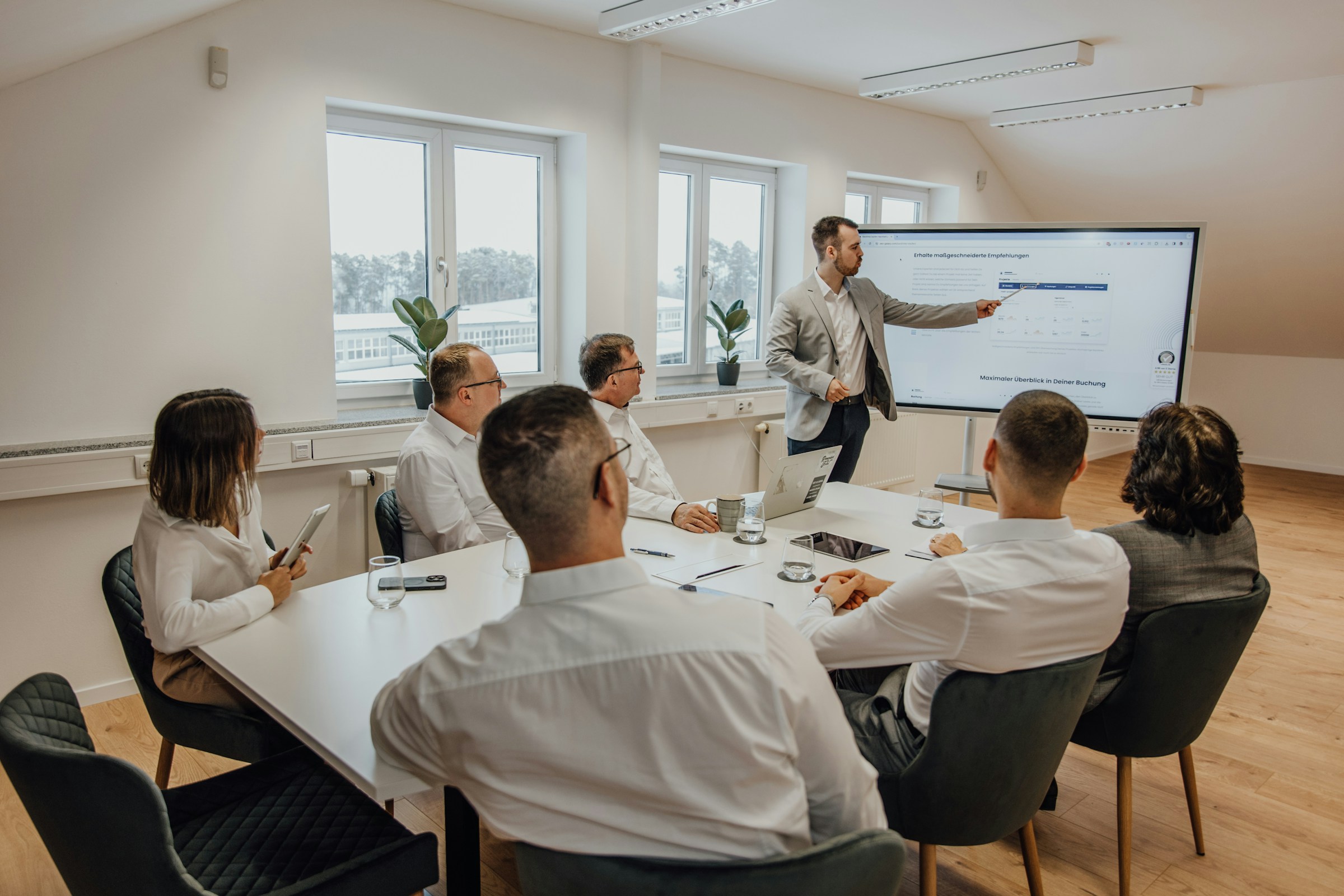 Professional team meeting discussing compliance